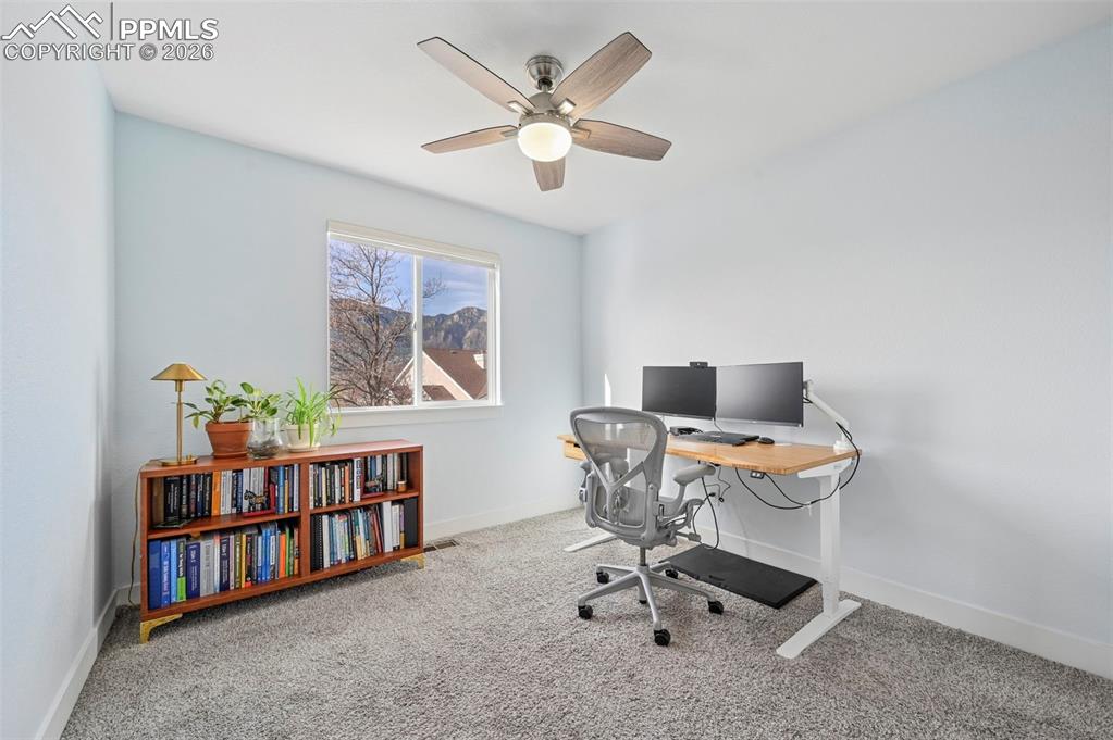 Image 26 of 34: Upper Level Bedroom