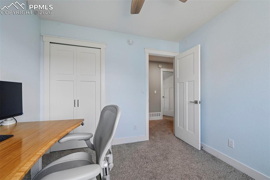 Image 27 of 34: Upper Level Bedroom