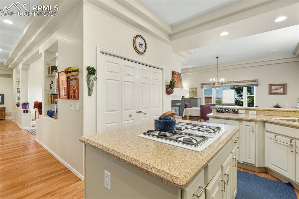 Image 16 of 50: Open floor plan, kitchen is open to front hallway