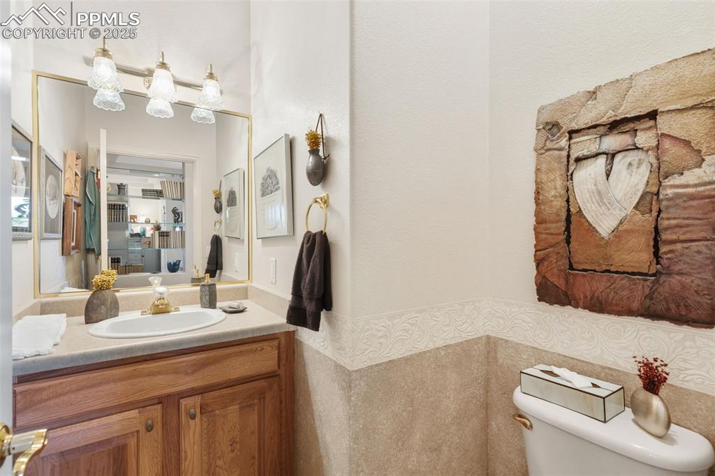 Image 19 of 50: main level half bath