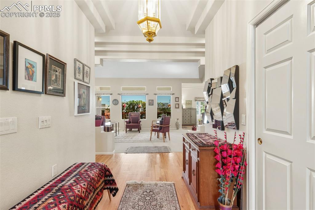 Image 3 of 50: Enter into a light filled Great Room with large Pella windows