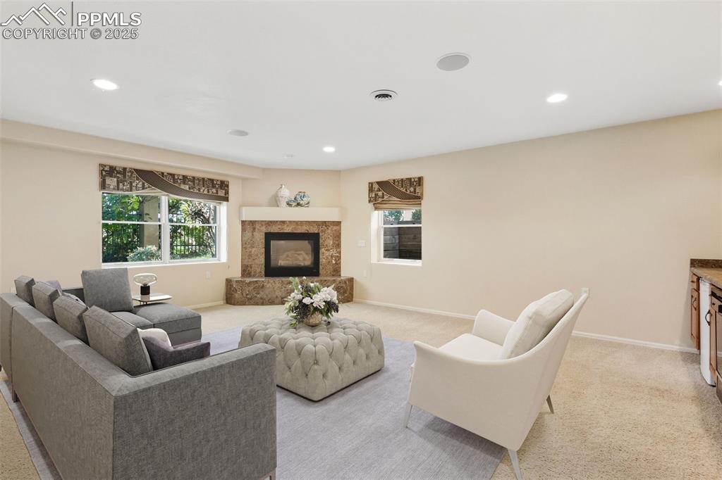 Image 36 of 50: VIRTUAL STAGED FAMILY ROOM 2 of 2 with fireplace