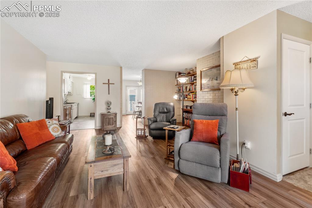 Image 8 of 37: View to Kitchen and Dining 