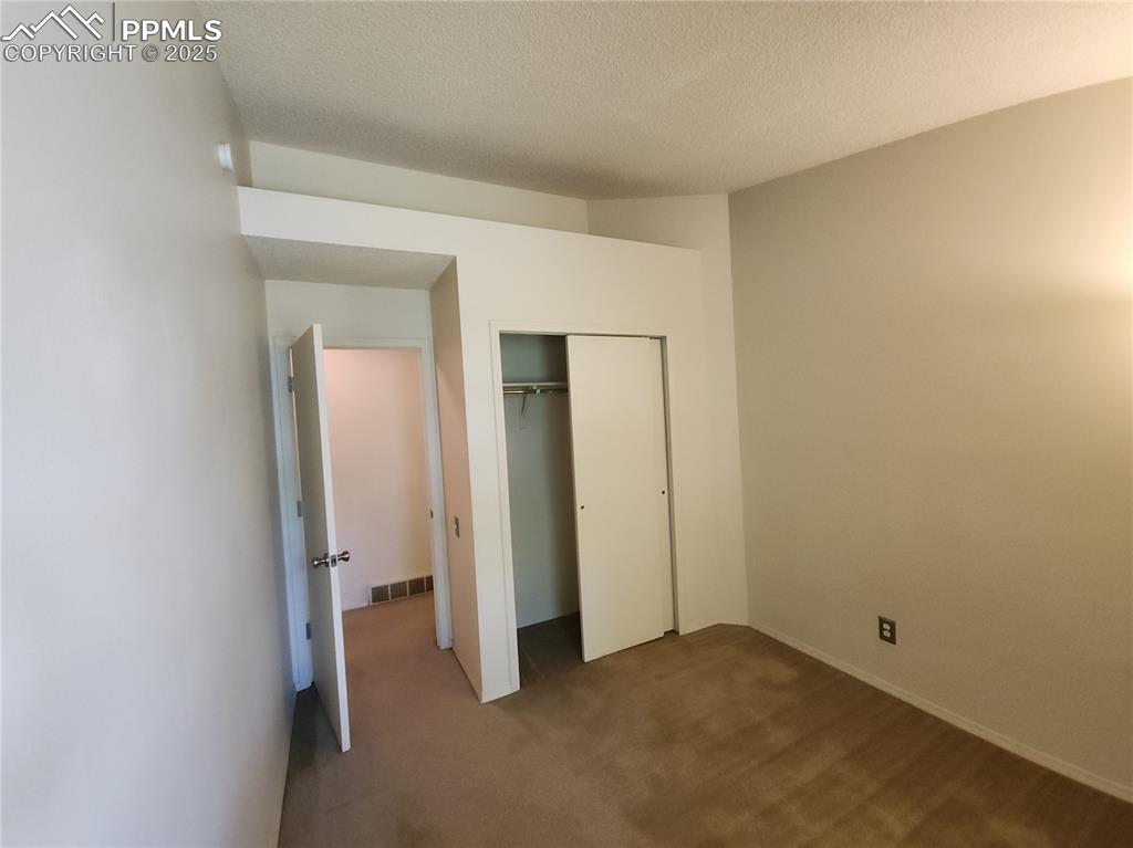 Image 15 of 18: Bedroom