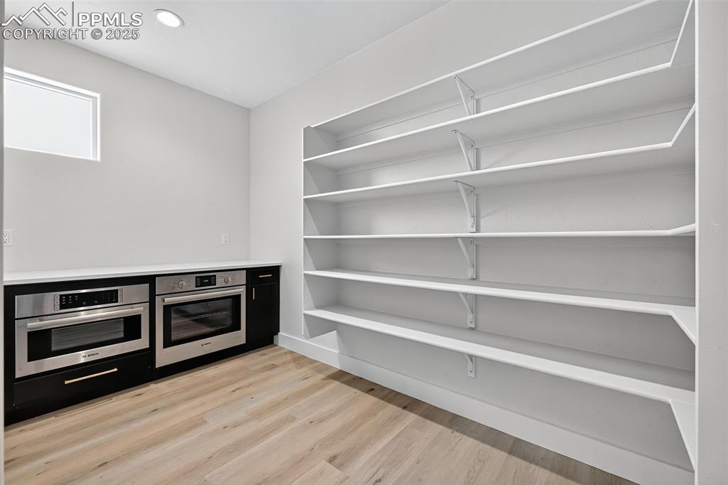 Image 12 of 42: Large walk-in pantry, view 2