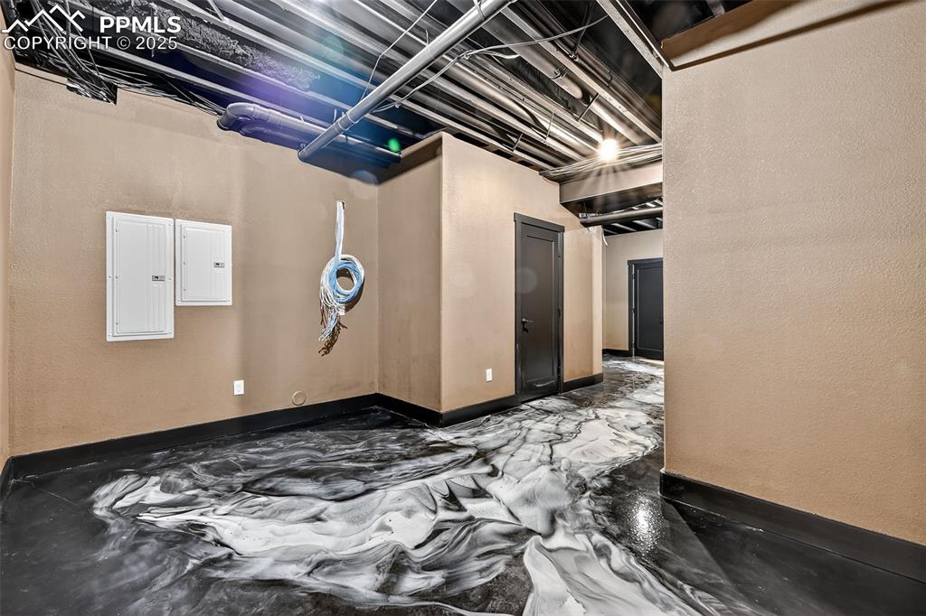 Image 30 of 42: hidden finished storage room for gym or ?