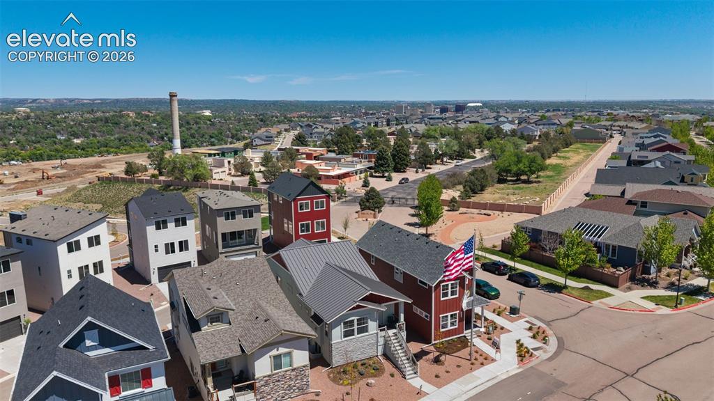 Image 39 of 41: Aerial perspective showcasing multiple properties with varied architectural