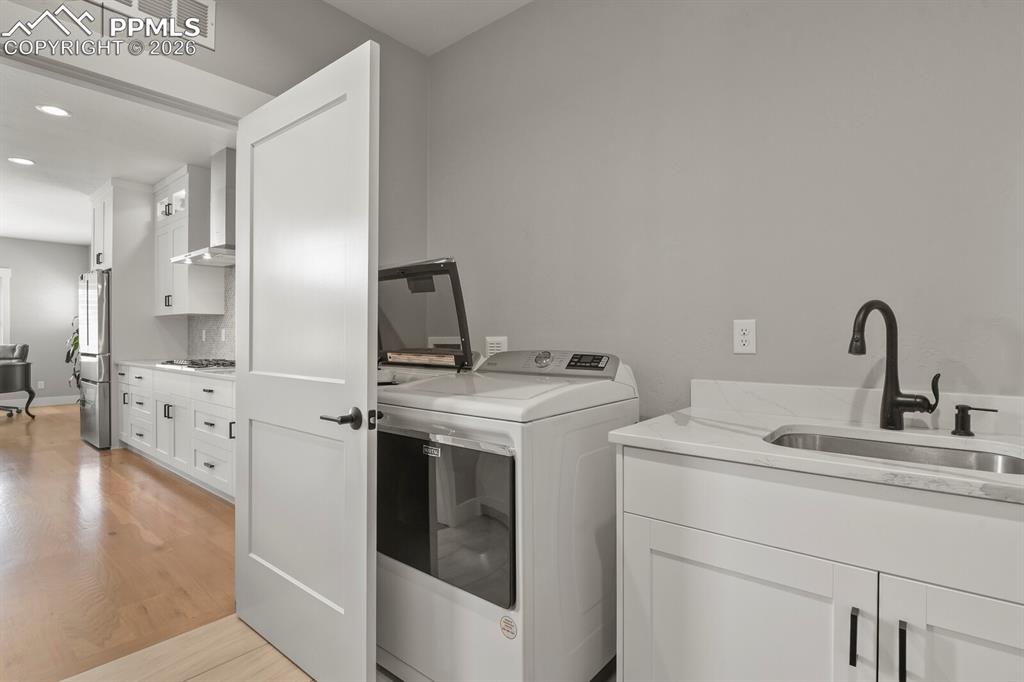 Image 24 of 48: Laundry Room to Kitchen