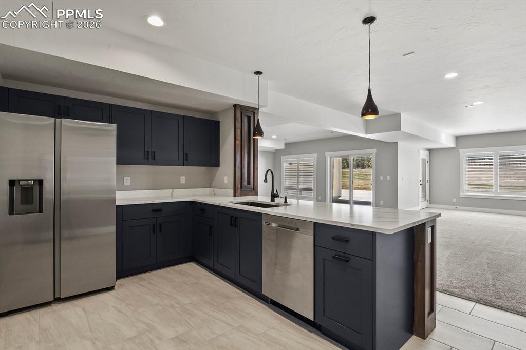 Image 29 of 48: Basement Kitchen