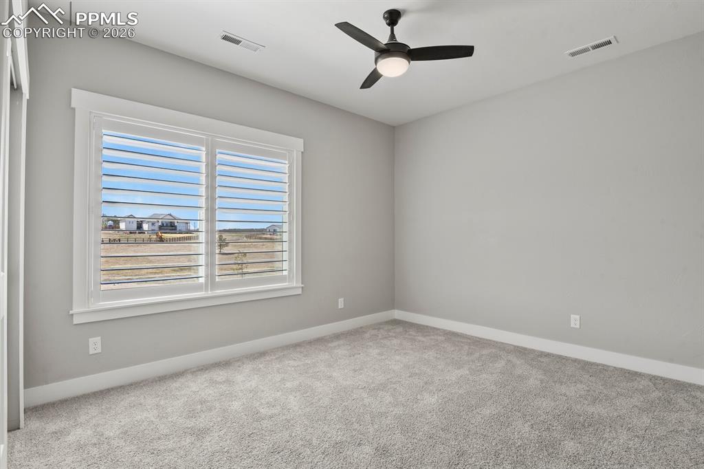 Image 38 of 48: Upper Floor Bedroom