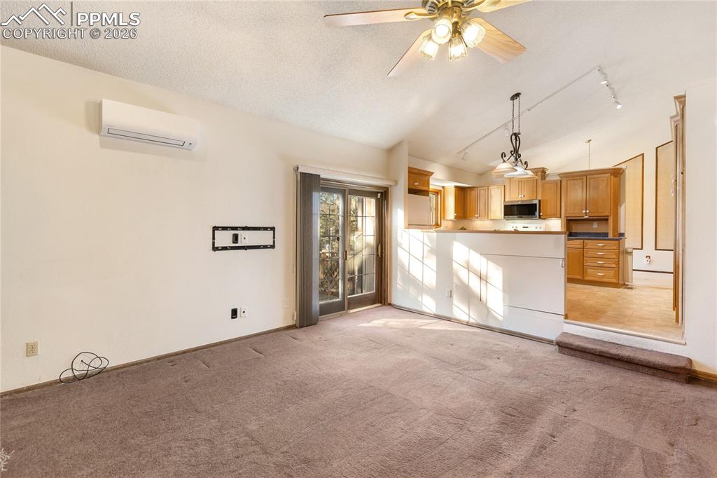 Image 15 of 42: Family Room into Kitchen