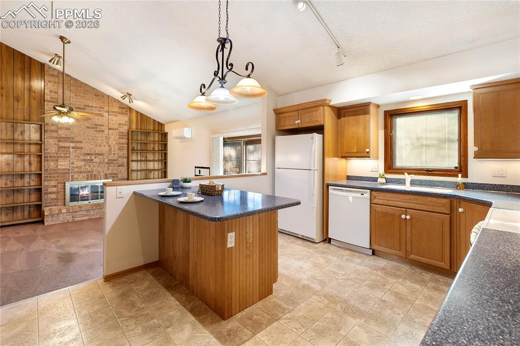 Image 16 of 42: Kitchen into Family Room