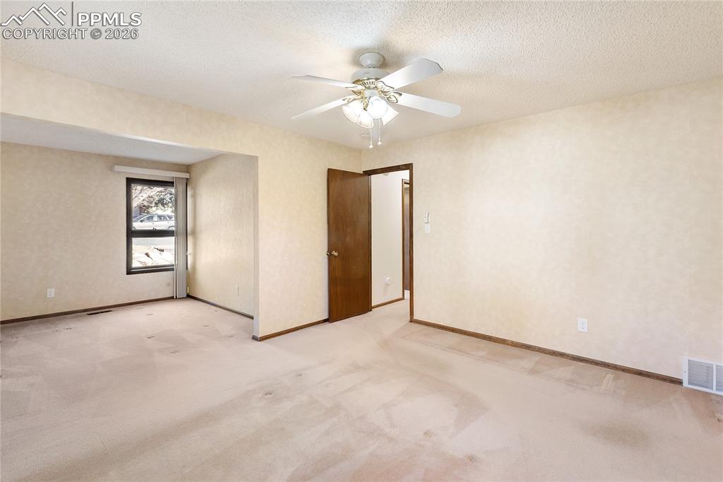 Image 22 of 42: Bedroom into sitting room/office