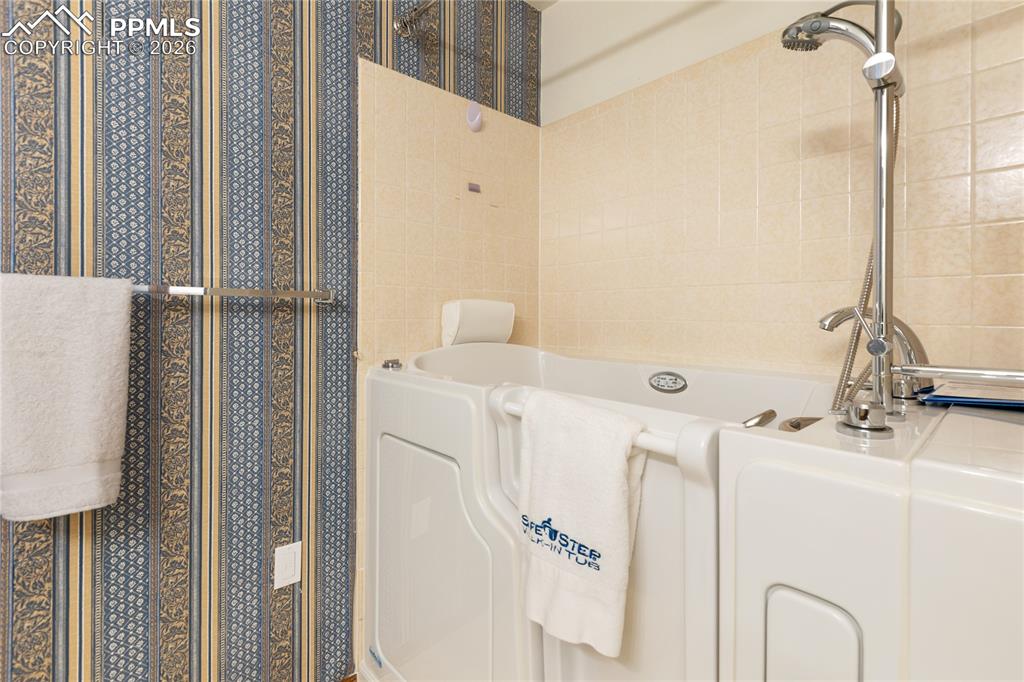 Image 27 of 42: Main level Hall Bath