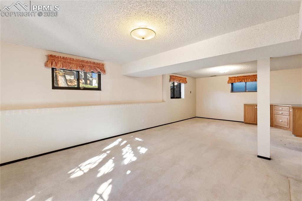 Image 34 of 42: Basement Family Room 