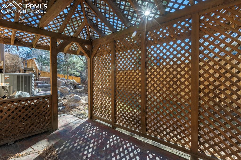 Image 38 of 42: Walk-out patio from basement.