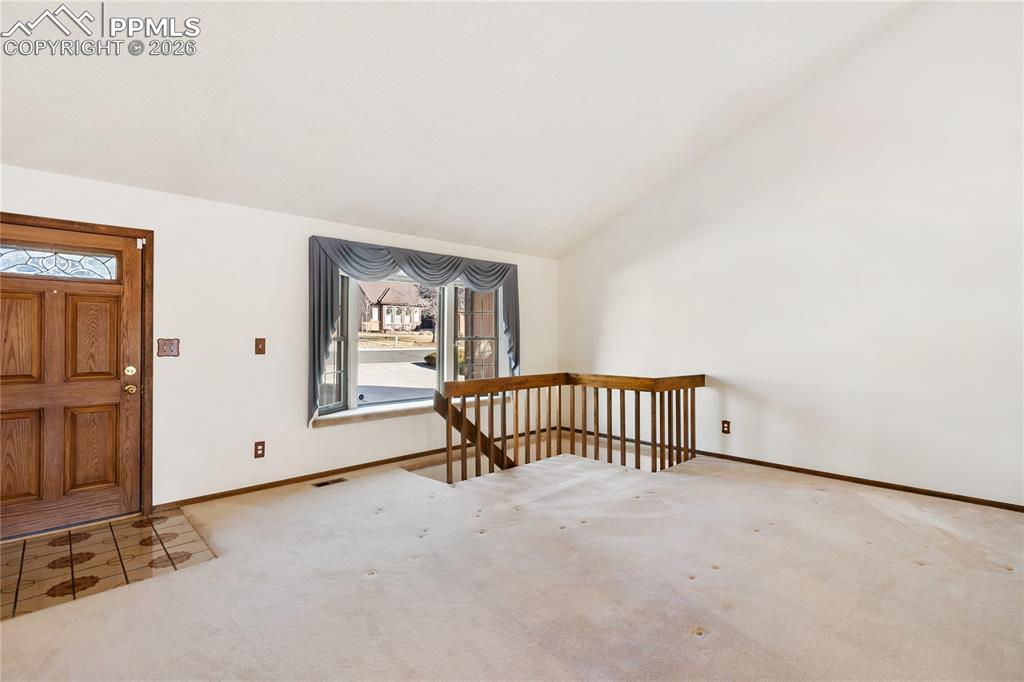 Image 9 of 42: Entry into Living Room