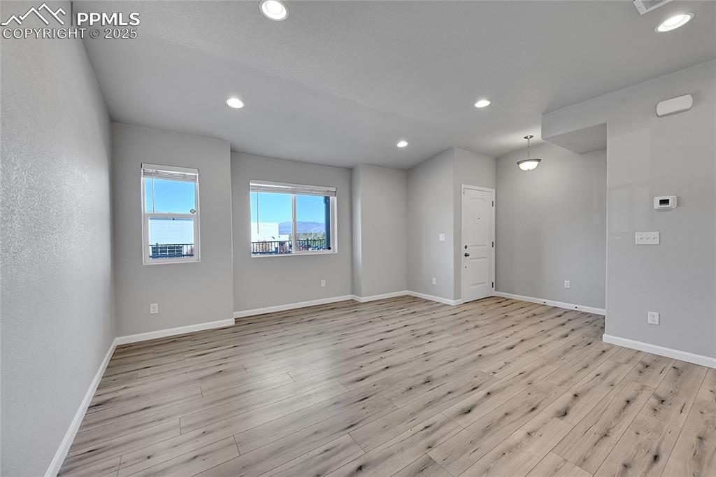 Image 10 of 46: Unfurnished room featuring recessed lighting and light wood-style floors