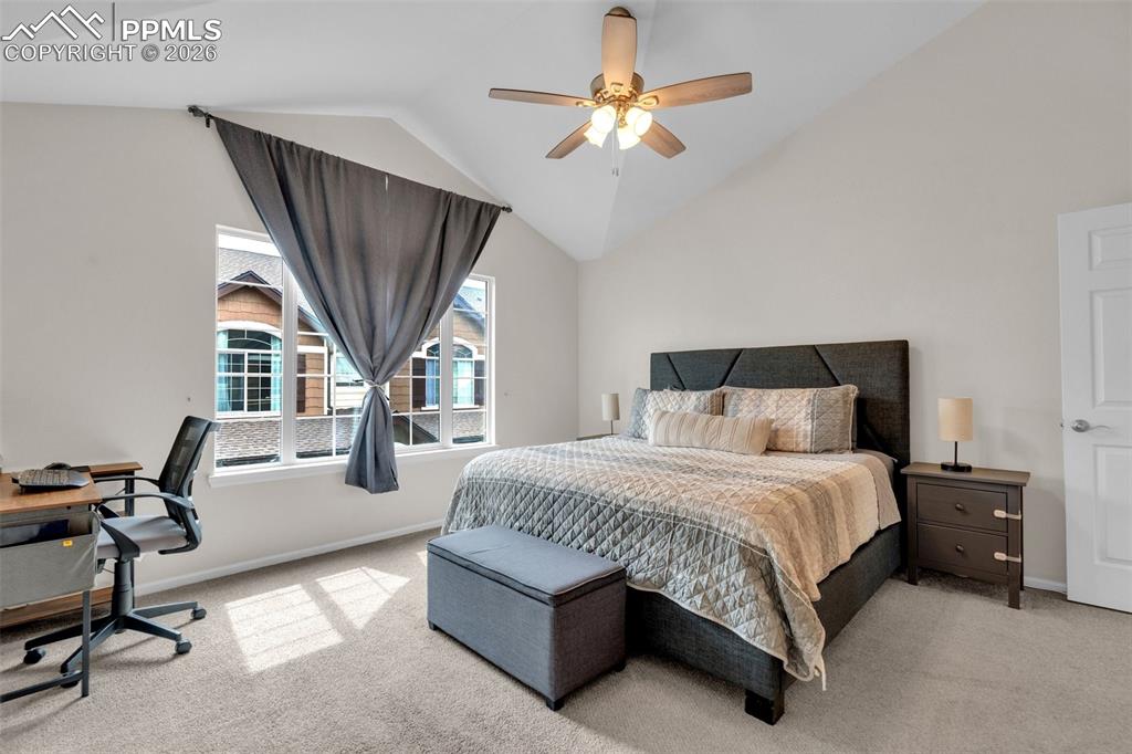 Image 19 of 39: Hallway with an upstairs landing and light carpet