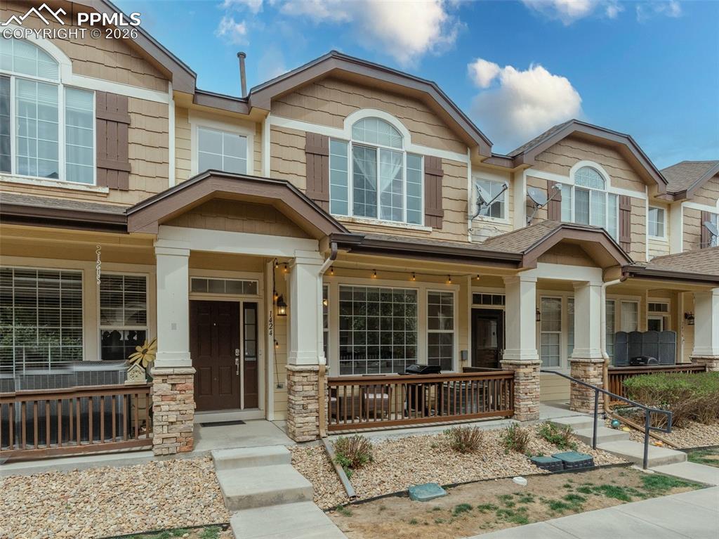 Image 2 of 39: Craftsman-style home featuring covered porch