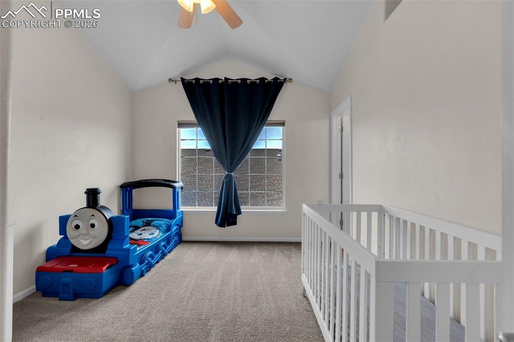 Image 23 of 39: Bathroom with double vanity, a shower stall, and a garden tub