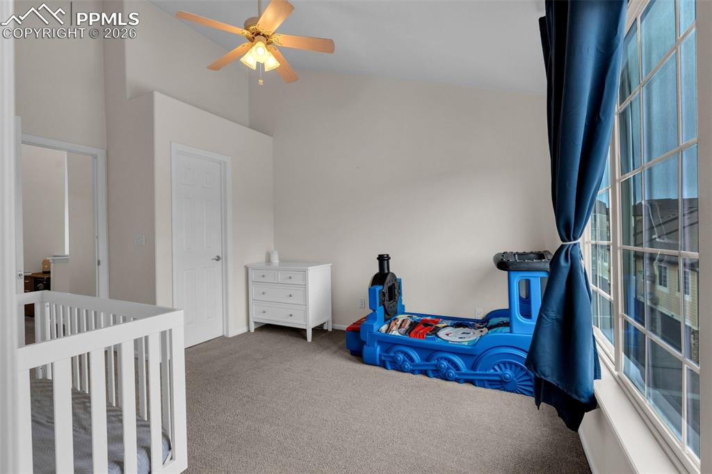 Image 24 of 39: Full bath featuring a shower stall, double vanity, and light tile patterned