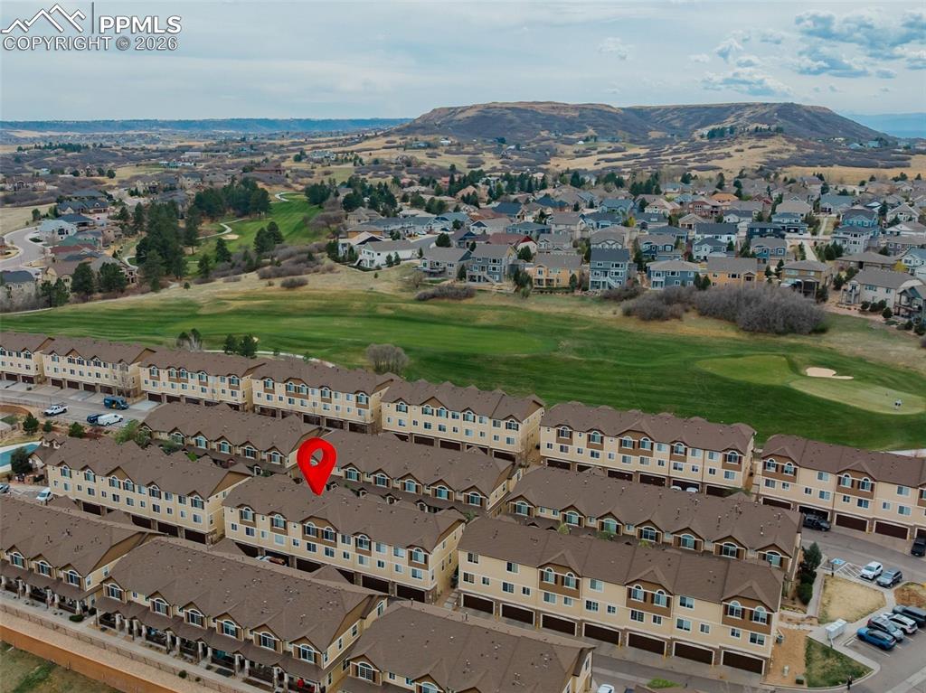 Image 31 of 39: Laundry area with separate washer and dryer and light tile patterned floori