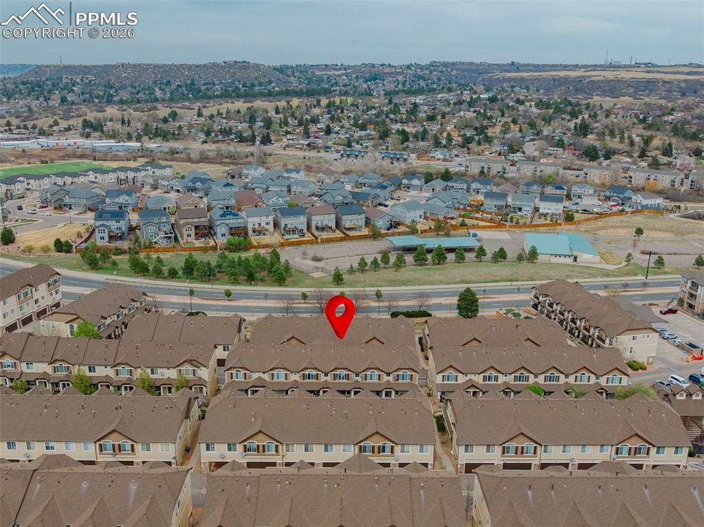 Image 32 of 39: View of community with a residential view and covered porch