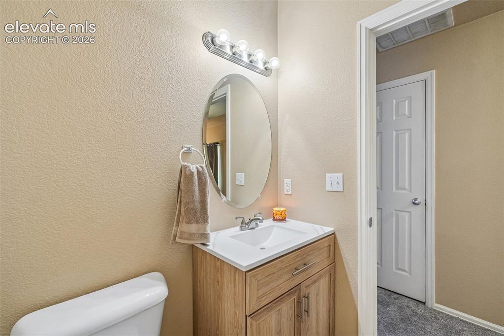 Image 11 of 29: powder bath on main level