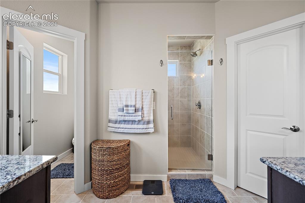 Image 12 of 48: Master Bathroom