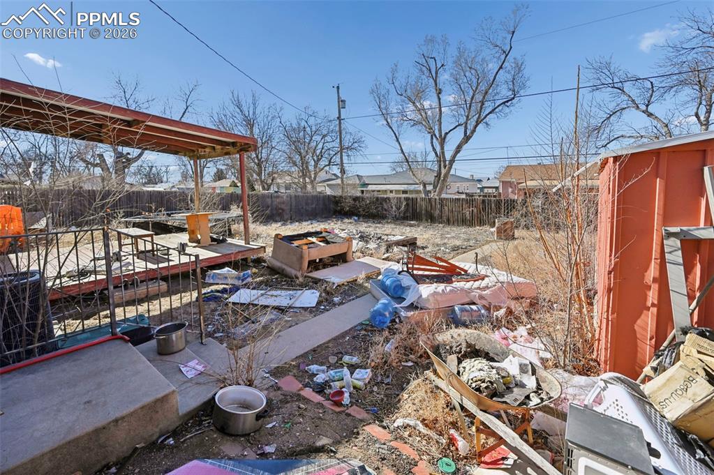 Image 23 of 27: Backyard Shed