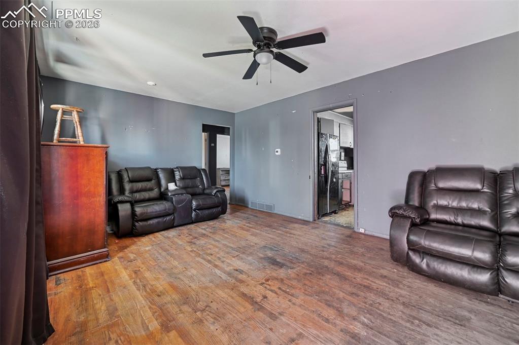 Image 5 of 27: Living room to kitchen and hall