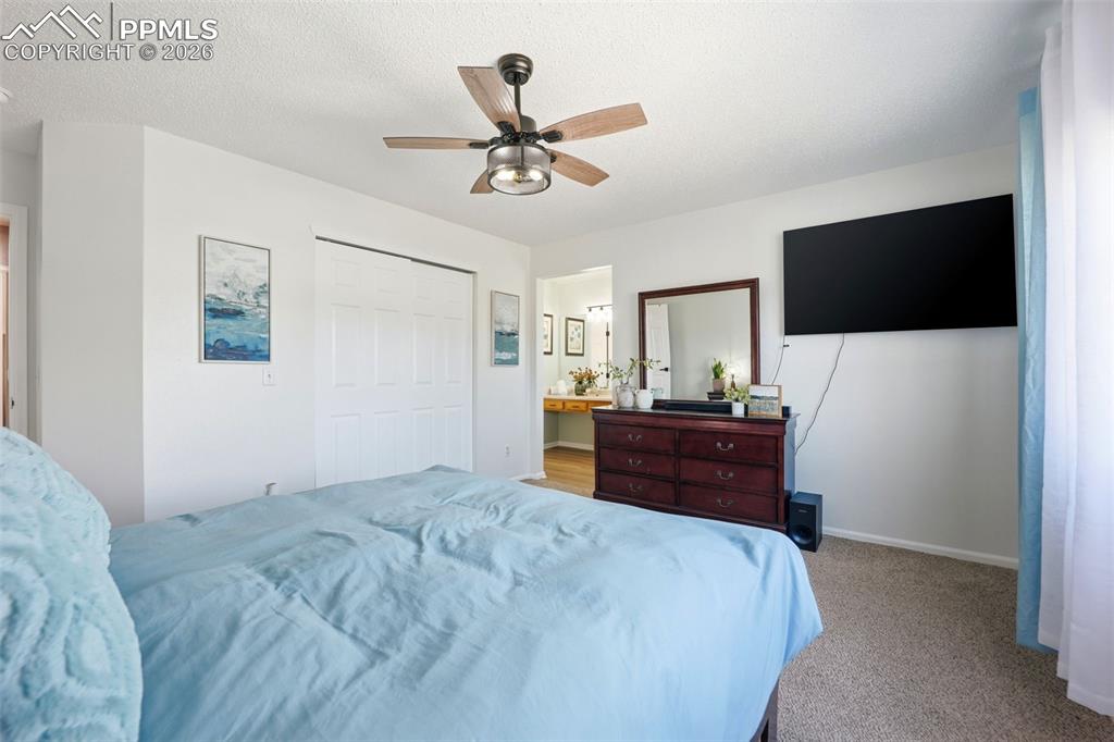 Image 16 of 42: Primary Bedroom with En-Suite Bathroom