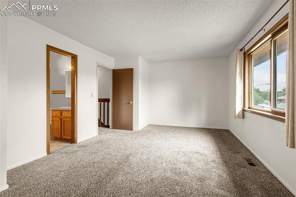 Image 13 of 25: Master Bedroom