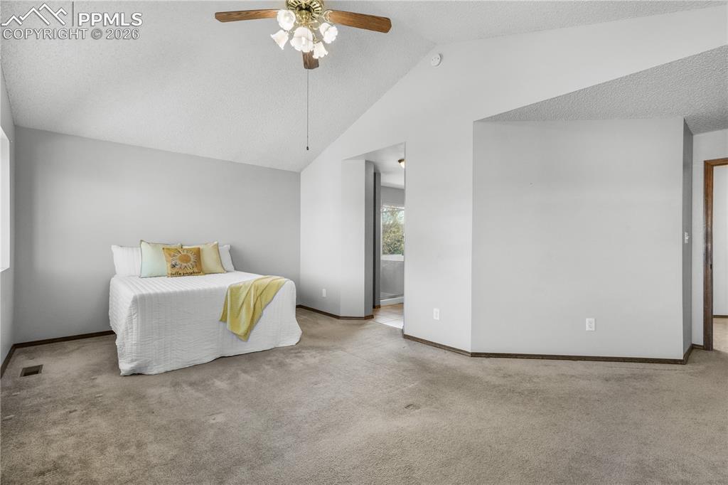 Image 25 of 50: Upstairs primary bedroom with ensuite 5 piece bath and large walk in closet