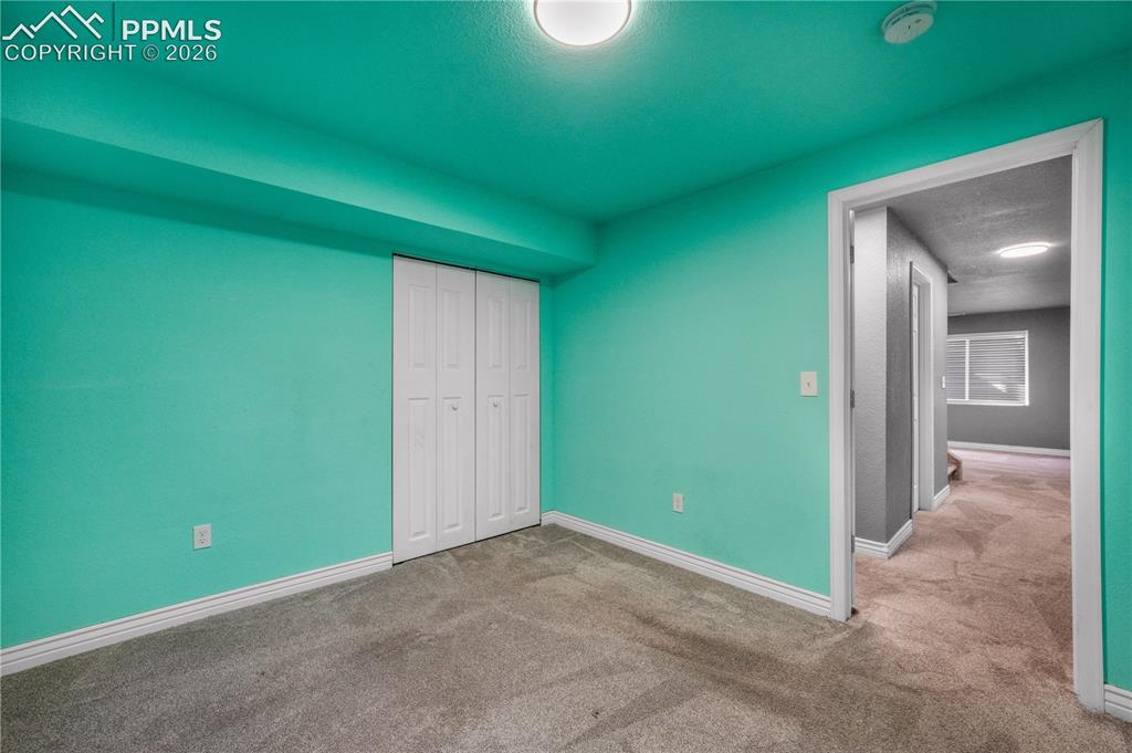 Image 45 of 50: Basement 5th bedroom