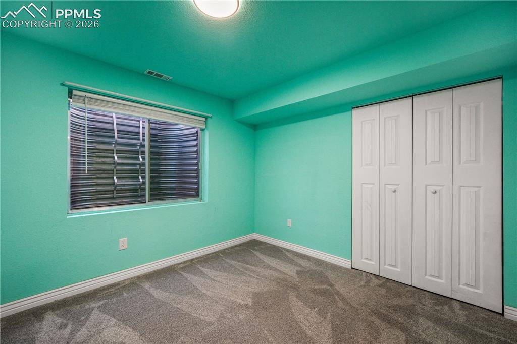 Image 46 of 50: Basement 5th bedroom