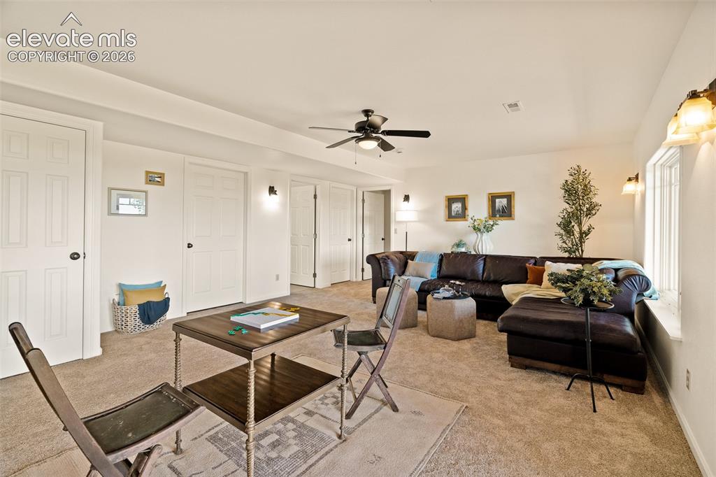 Image 26 of 50: Basement family room photographed June 2026