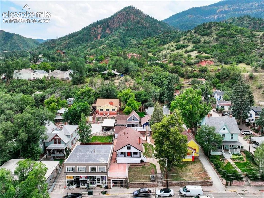 Image 1 of 39: Collective community of 4 cottages with 125 Ruxton and 129 Ruxton being sol