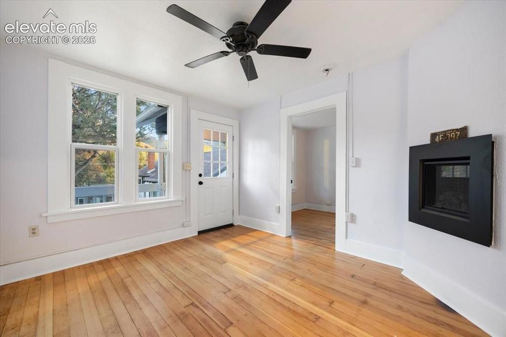 Image 23 of 39: Cottage 3 - refreshed wood floors