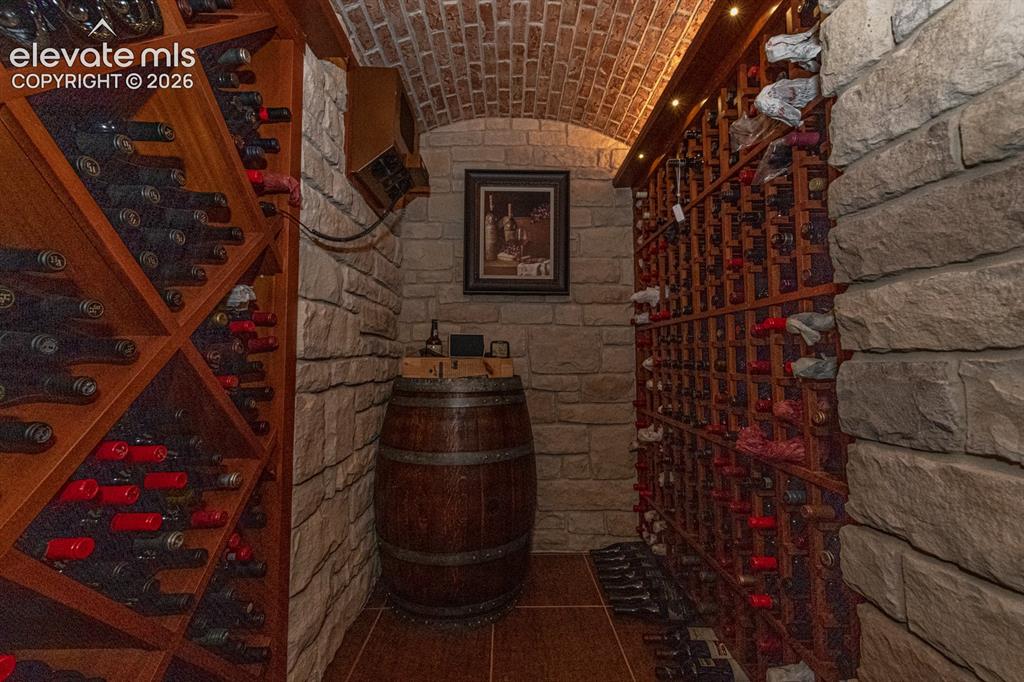 Image 44 of 50: Bar area conditioned wine cellar.