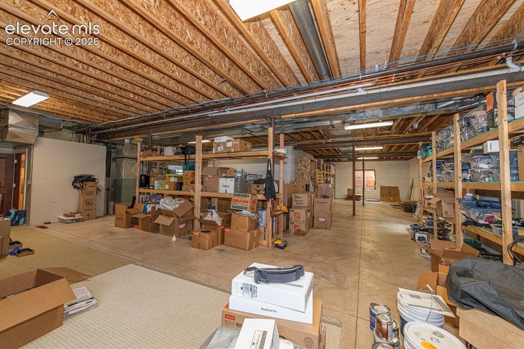 Image 48 of 50: Basement storage are