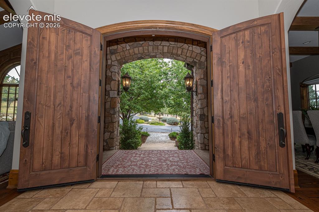 Image 5 of 50: A view of the entry towards the circular drive.