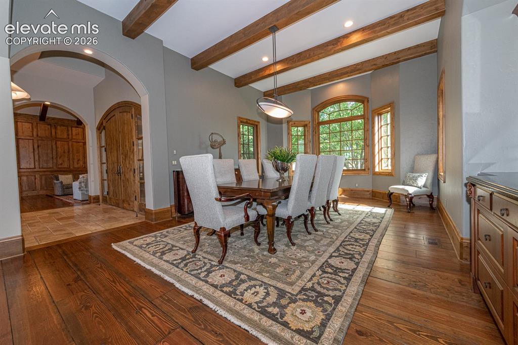 Image 8 of 50: Large formal dining right off the entry.