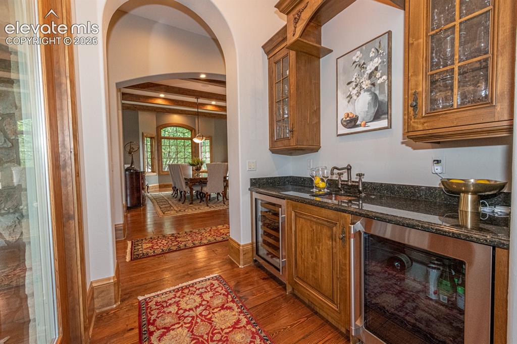 Image 9 of 50: Butler pantry with wet bar and 2 refrigerators for entertaining