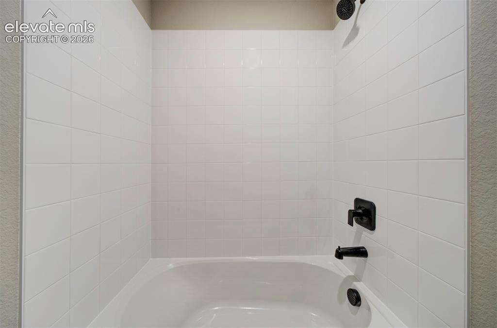Image 34 of 35: **Pictures are from a previously completed home, not from listed home