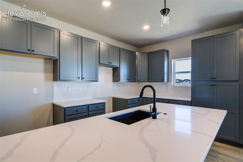 Image 8 of 35: **Pictures are from a previously completed home, not from listed home