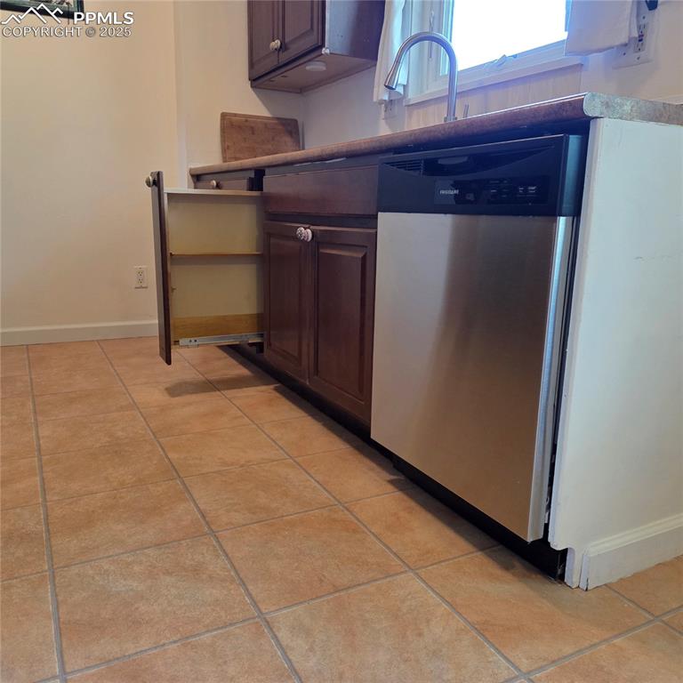 Image 12 of 45: Check out the NEW SS dishwasher and clever pull-out spice rack