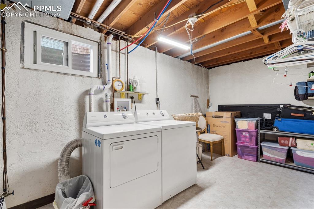 Image 34 of 45: Large Laundry Room and Storage area