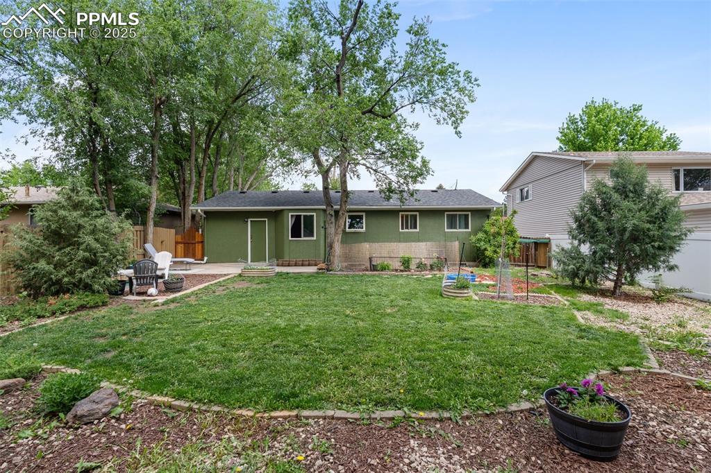 Image 41 of 45: Shady yard for pets, gardens and play